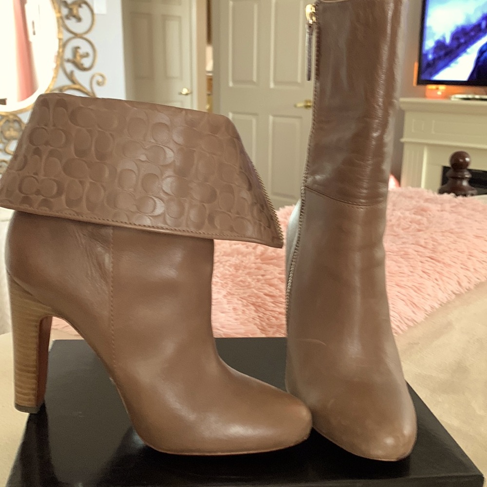 Beautiful tan colored mid calf Coach boots